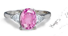 engagement ring three stone with oval pink sapphire and side trillion diamonds