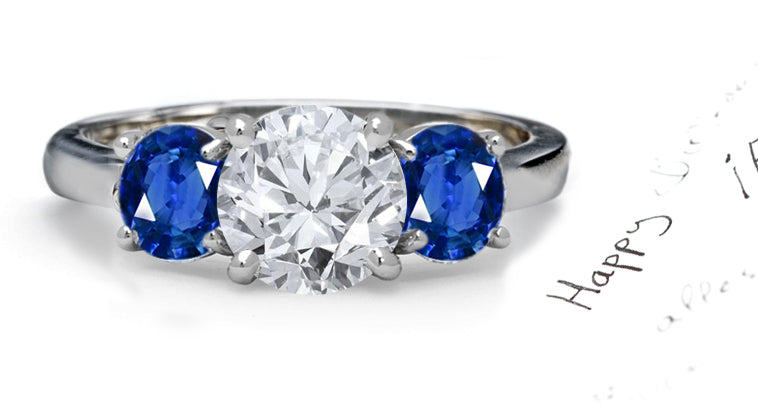 engagement ring three stone with round diamond and side round blue sapphires