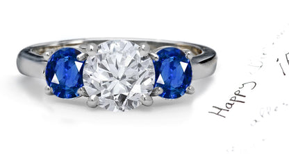 engagement ring three stone with round diamond and side round blue sapphires