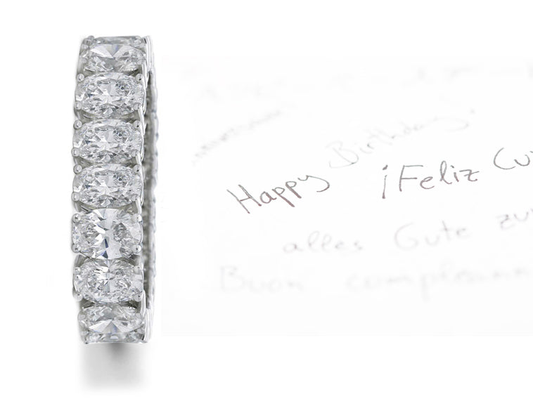 eternity ring prong set with oval diamonds