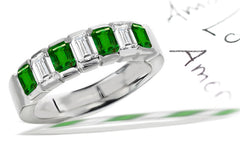 anniversary ring with emerald cut emeralds and diamonds