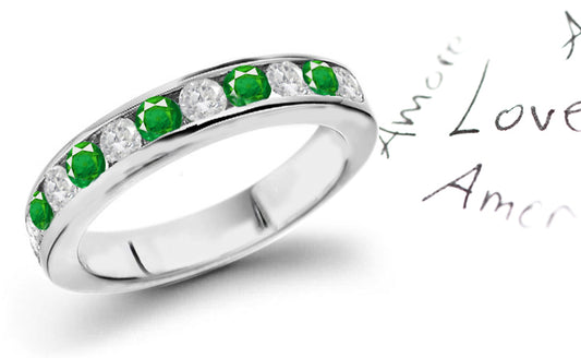 anniversary ring channel set with round emeralds and diamonds