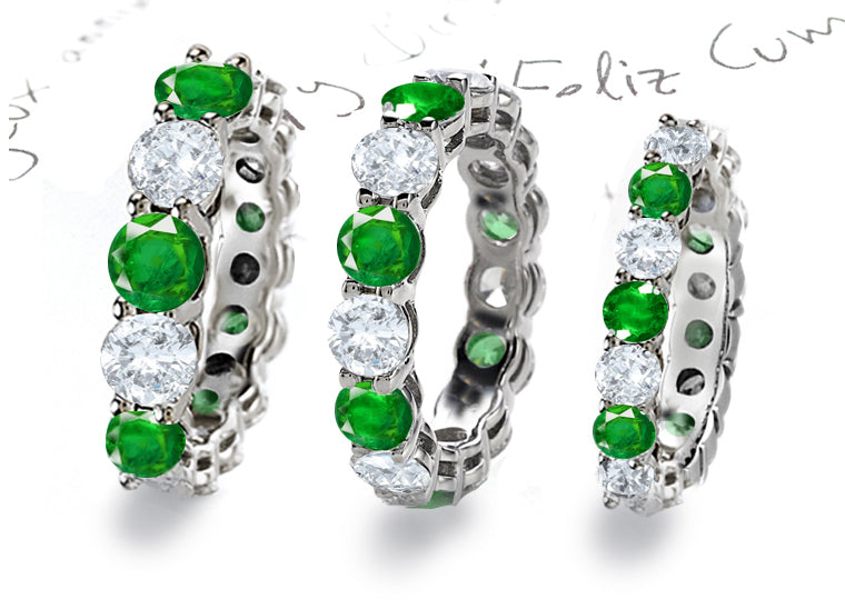 eternity ring prong set with round emeralds and diamonds